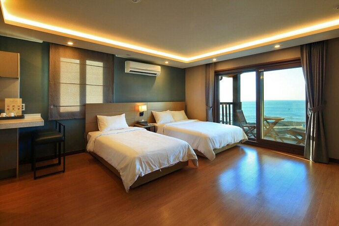 Imagen de la habitación del Hotel Amber House, Jeju. Foto 22