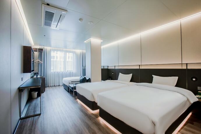 Imagen de la habitación del Hotel Amber Jeju. Foto 12