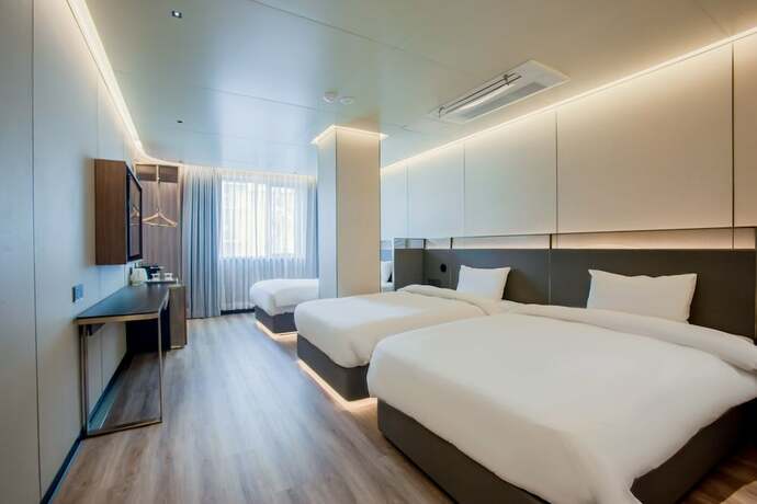 Imagen de la habitación del Hotel Amber Jeju. Foto 15