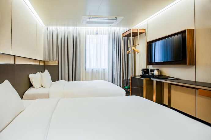 Imagen de la habitación del Hotel Amber Jeju. Foto 17