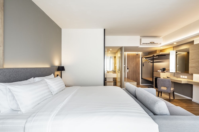 Imagen de la habitación del Hotel Amber Pattaya. Foto 14