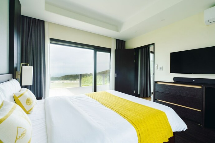 Imagen de la habitación del Hotel Amber Resort Jeju. Foto 3
