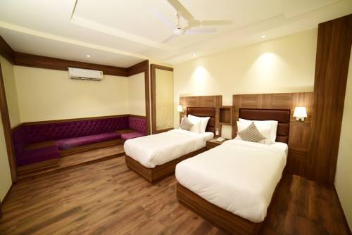 Imagen de la habitación del Hotel Amber, Rudrapur. Foto 4