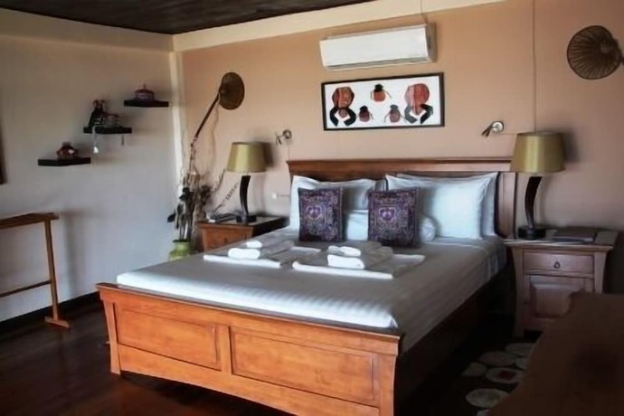 Imagen de la habitación del Hotel Amber Sands Beach Resort. Foto 13