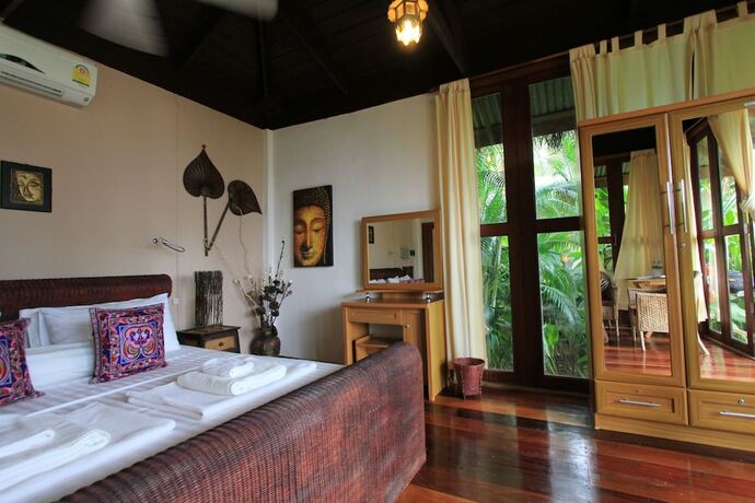 Imagen de la habitación del Hotel Amber Sands Beach Resort. Foto 16