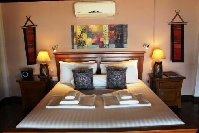 Imagen de la habitación del Hotel Amber Sands Beach Resort. Foto 29