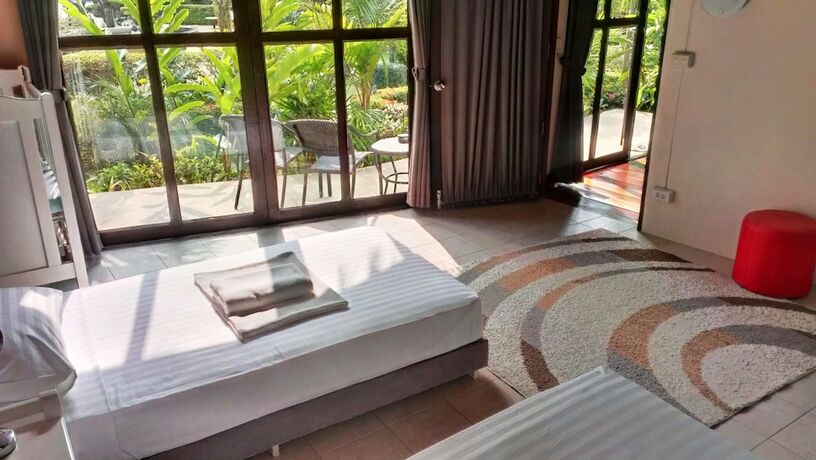 Imagen de la habitación del Hotel Amber Sands Beach Resort. Foto 32