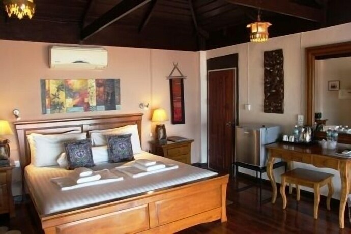 Imagen de la habitación del Hotel Amber Sands Beach Resort. Foto 33