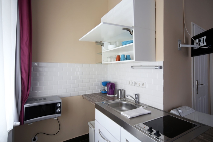 Imagen de la habitación del Hotel Amber Terrace Studio. Foto 3