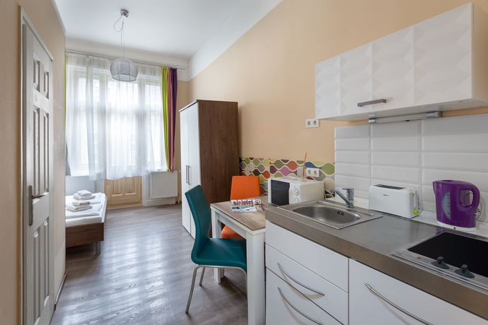 Imagen de la habitación del Hotel Amber Terrace Studio. Foto 6