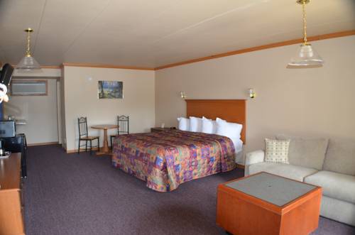 Imagen de la habitación del Hotel Amber's Inn and Suites. Foto 2