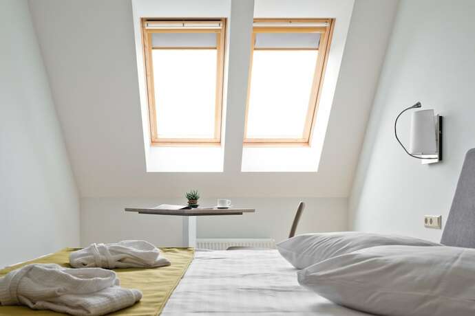 Imagen de la habitación del Hotel Amberton Green Apartments Palanga. Foto 18