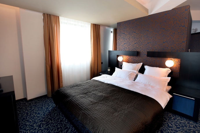 Imagen de la habitación del Hotel Ambiance, Bucarest. Foto 8