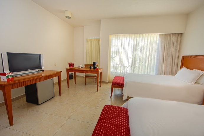 Imagen de la habitación del Hotel Ambiance Suites Cancun. Foto 7