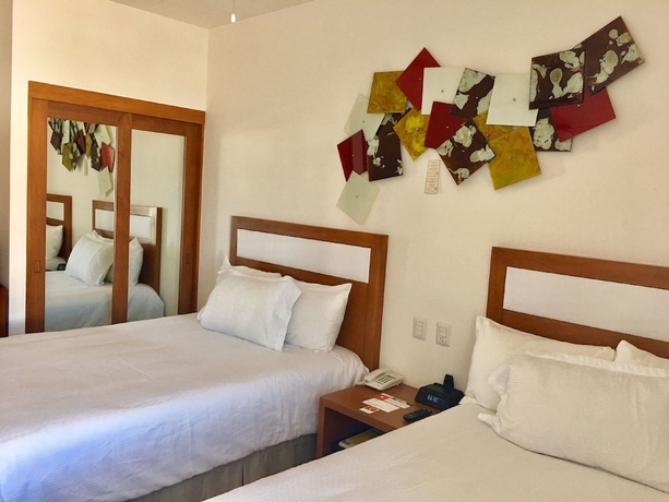 Imagen de la habitación del Hotel Ambiance Suites Cancun. Foto 14