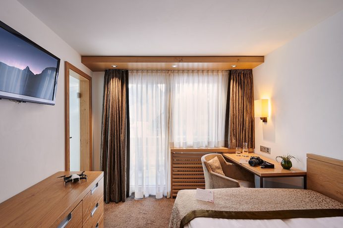 Imagen de la habitación del Hotel Ambiance Superior. Foto 12