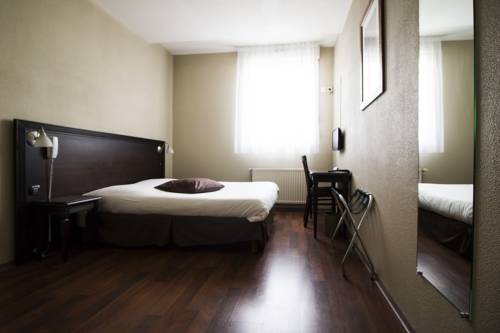 Imagen de la habitación del Hotel Ambiance, VILLEFRANCHE-SUR-SAONE. Foto 11