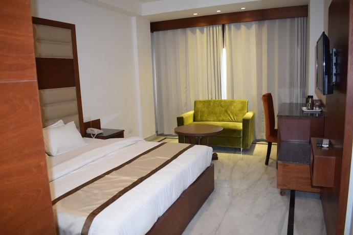 Imagen de la habitación del Hotel Ambica Katra. Foto 11
