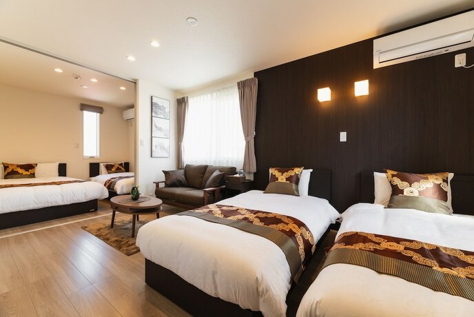 Imagen de la habitación del Hotel Ambicia Sasebo. Foto 33