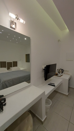 Imagen de la habitación del Hotel Ambience Suites. Foto 15