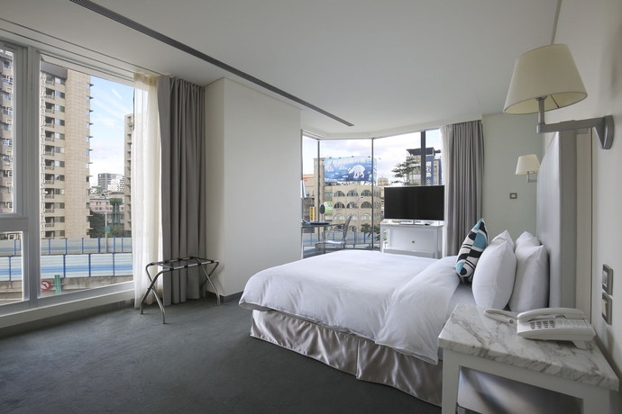 Imagen de la habitación del Hotel Ambience Taipei. Foto 3