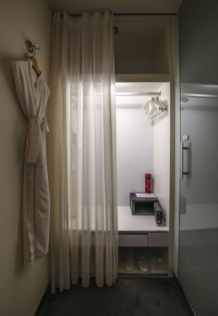 Imagen de la habitación del Hotel Ambience Taipei. Foto 8