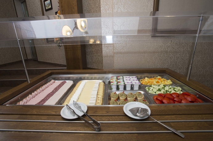 Imagen del bar/restaurante del Hotel Ambient, Brasov. Foto 6