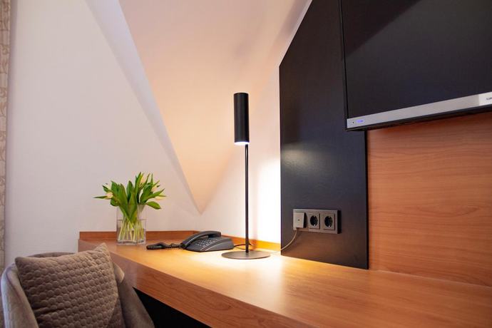 Imagen de la habitación del Hotel Ambient Tassilo. Foto 5