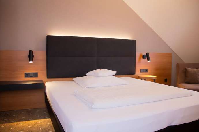 Imagen de la habitación del Hotel Ambient Tassilo. Foto 6