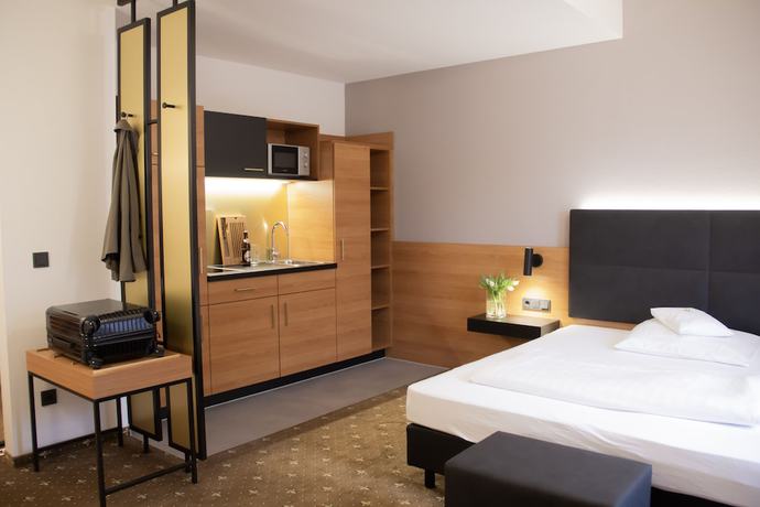 Imagen de la habitación del Hotel Ambient Tassilo. Foto 7
