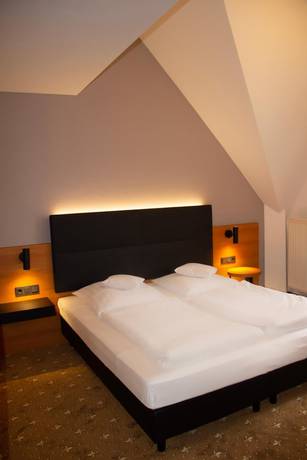 Imagen de la habitación del Hotel Ambient Tassilo. Foto 8