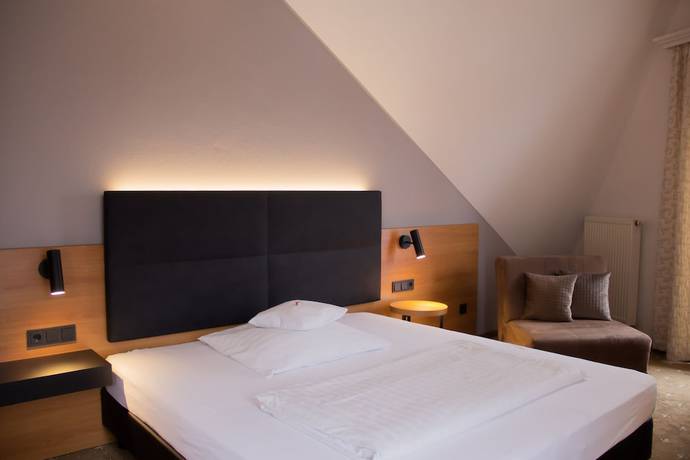 Imagen de la habitación del Hotel Ambient Tassilo. Foto 9