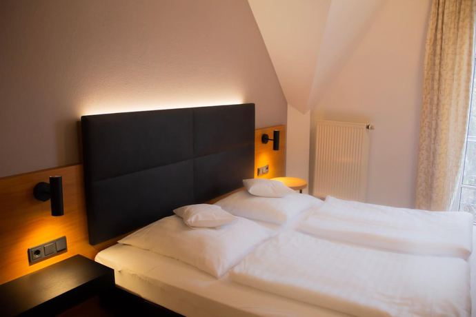 Imagen de la habitación del Hotel Ambient Tassilo. Foto 10