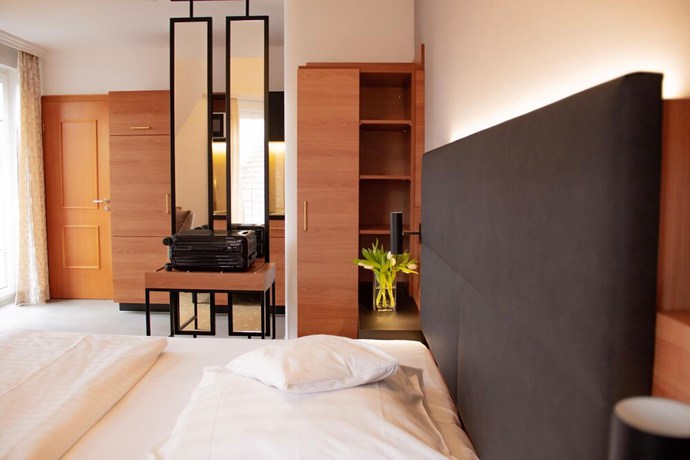 Imagen de la habitación del Hotel Ambient Tassilo. Foto 13