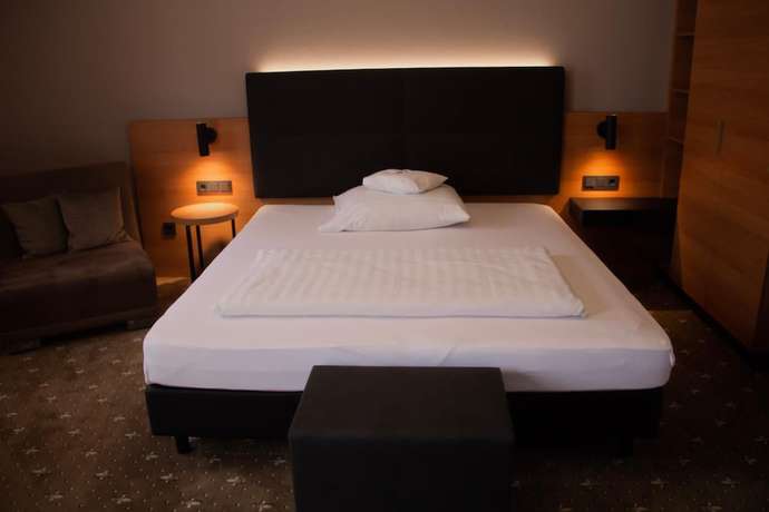 Imagen de la habitación del Hotel Ambient Tassilo. Foto 14