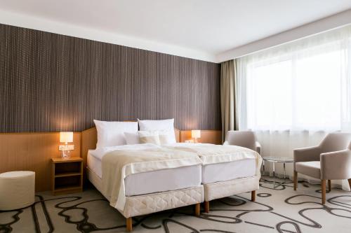 Imagen de la habitación del Hotel Ambient & Aroma Spa. Foto 10