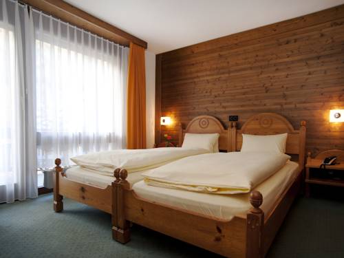 Imagen de la habitación del Hotel Ambiente Guesthouse. Foto 9