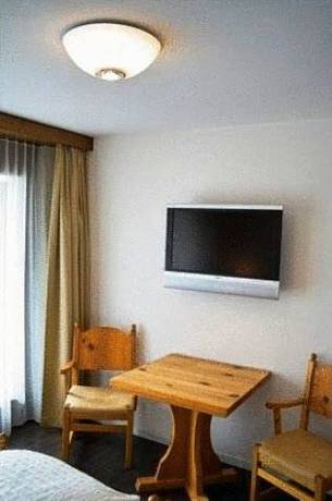 Imagen de la habitación del Hotel Ambiente Guesthouse. Foto 14