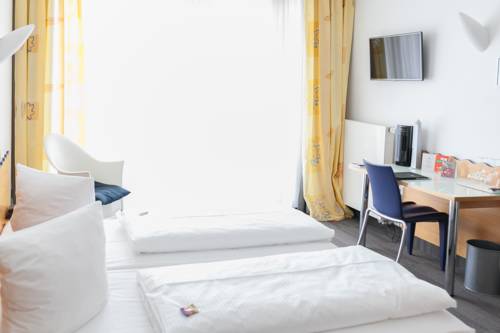 Imagen de la habitación del Hotel Ambiente, Munster. Foto 3