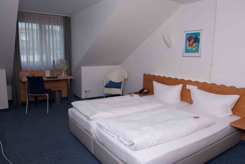 Imagen de la habitación del Hotel Ambiente, Munster. Foto 6