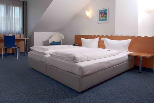 Imagen de la habitación del Hotel Ambiente, Munster. Foto 7