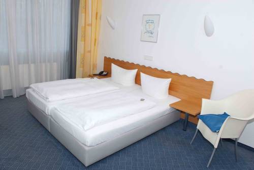 Imagen de la habitación del Hotel Ambiente, Munster. Foto 11