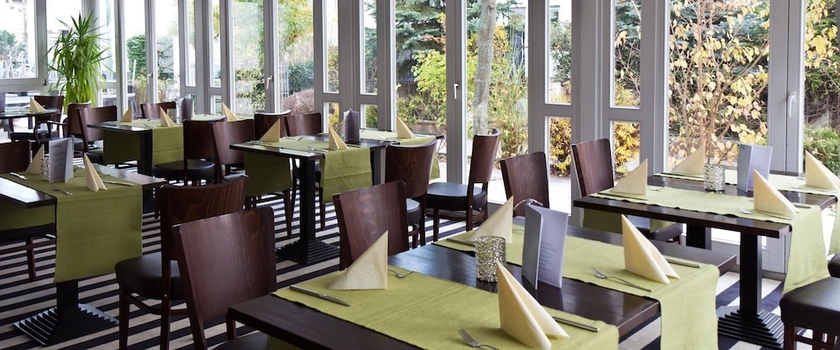 Imagen del bar/restaurante del Hotel Ambiente Walldorf. Foto 5