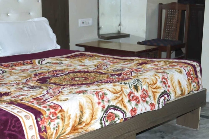 Imagen de la habitación del Hotel Ambika Palace by Shiwani Associate. Foto 3