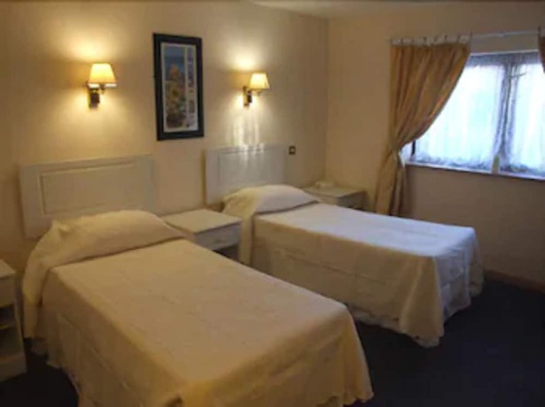 Imagen de la habitación del Hotel Amblehurst. Foto 7