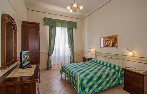 Imagen de la habitación del Hotel Ambra, Forte de Marmi. Foto 1