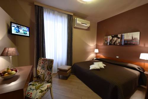 Imagen de la habitación del Hotel Ambra Hotel. Foto 12