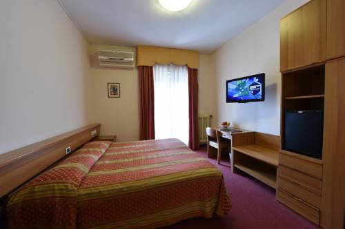 Imagen de la habitación del Hotel Ambra Hotel. Foto 14