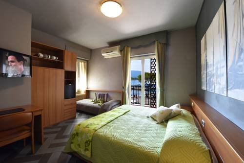 Imagen de la habitación del Hotel Ambra Hotel. Foto 16