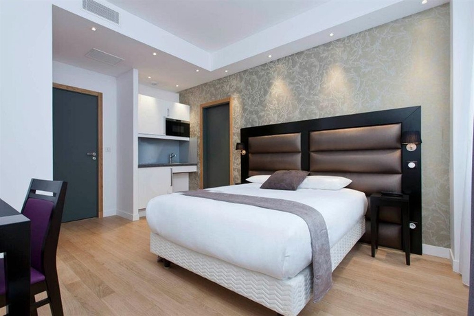 Imagen de la habitación del Hotel Ambre Hotel. Foto 2